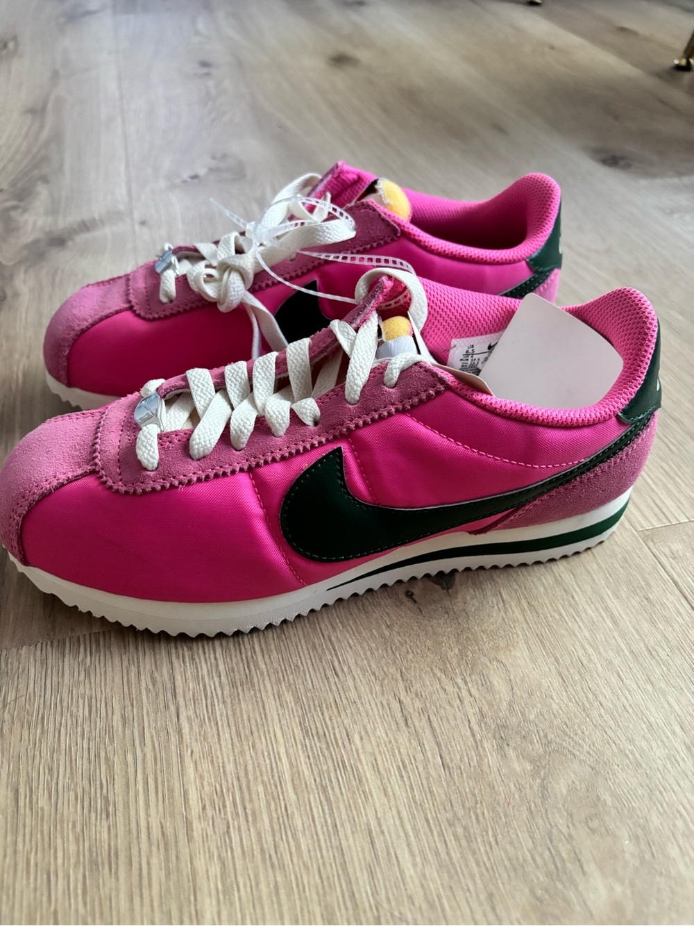 Nike Women's Running Sneaker in Bright Pink with Dark Green Swoosh